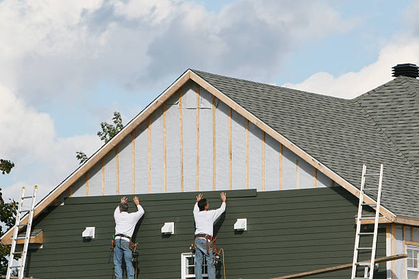 Professional Siding Contractor technician working in New Paris, IN